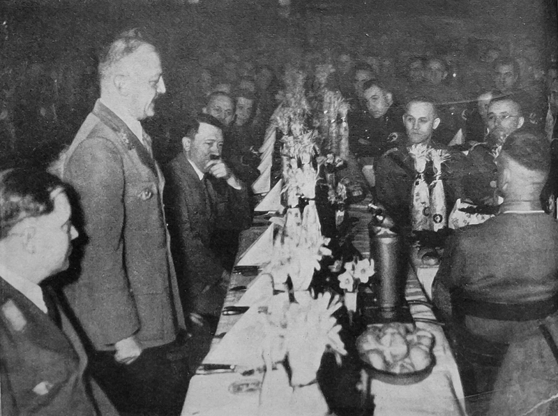 Adolf Wagner speaks at the Christmas party in Loewenbraeukeller
